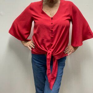 red V-neck button up blouse featuring gorgeous flared sleeves!